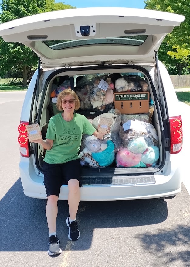 trunk filled with donated bears and blankets