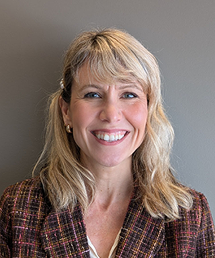 smiling woman with long blonde hair