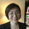 smiling woman in library